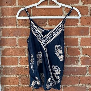 Floral pattern sleeveless surplice top - S